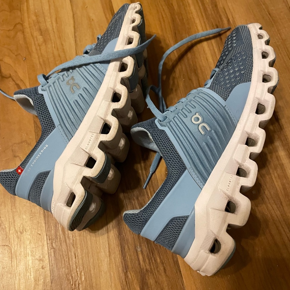 On Running Blue and White Sneakers with Cloud Cushioning